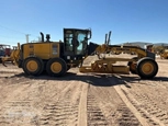 Side of used Komatsu Motor Grader in yard
